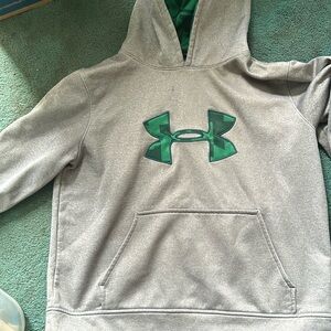 Youth Under Armour hoodie. Size LG Loose. Light Grey with big green UA symbol.
